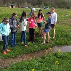 Graduate students working at ND-LEEF teach young scientists about aquatic ecology as part of the Science for Ambitious Girls Program.