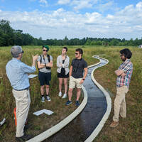 Team learns about research at the Notre Dame Linked Experimental Ecosystem Facility (ND-LEEF).